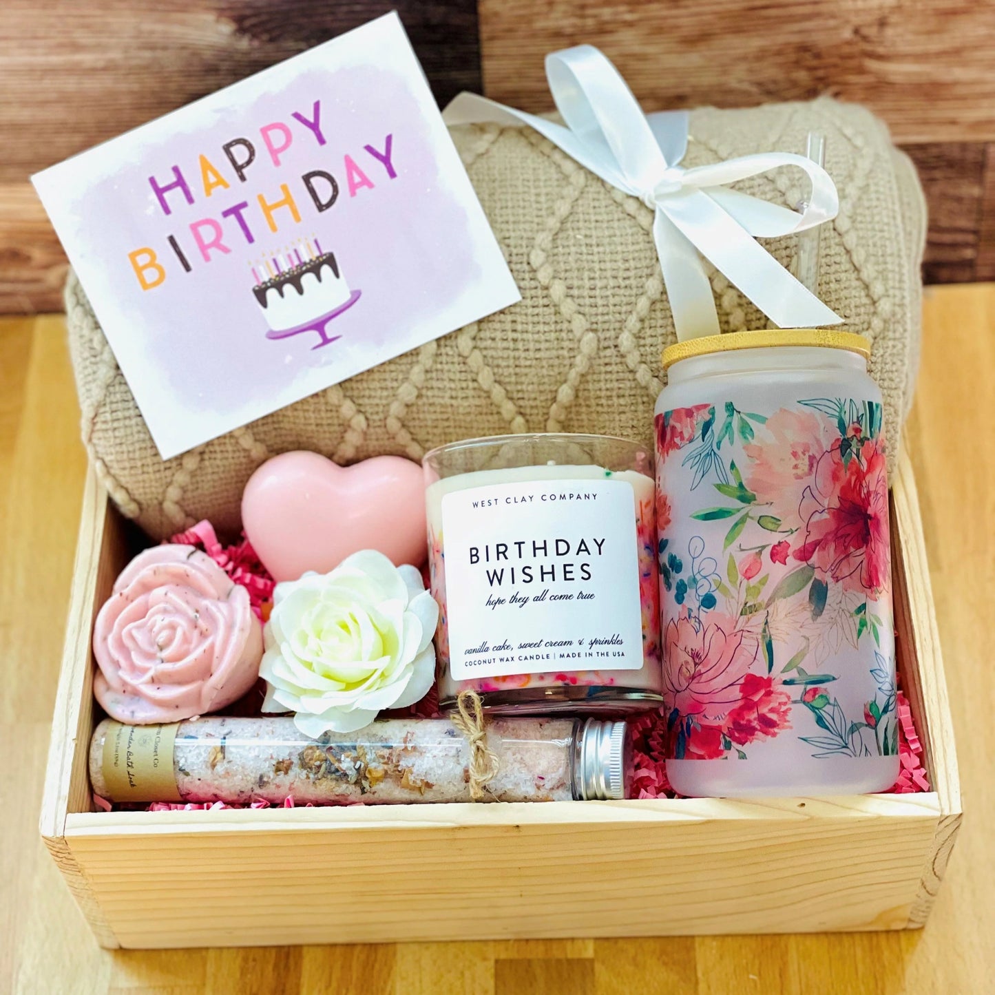 birthday gift box. Has birthday large candle, beautiful blanket, french soaps, libby handmade drinking cup, and rose bath salt. Everything to make a Birthday Gift special.