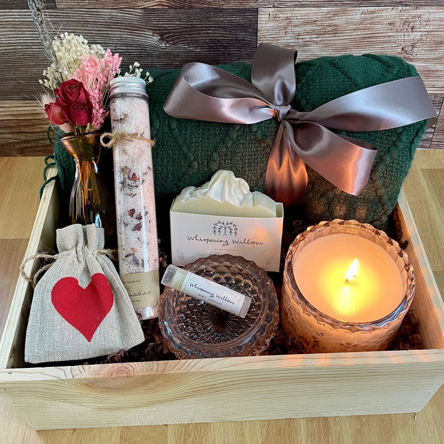 Beautiful Gift Box with Bath salts, candle, chapstick, tea, candle, and throw blanket in cute wood crate.