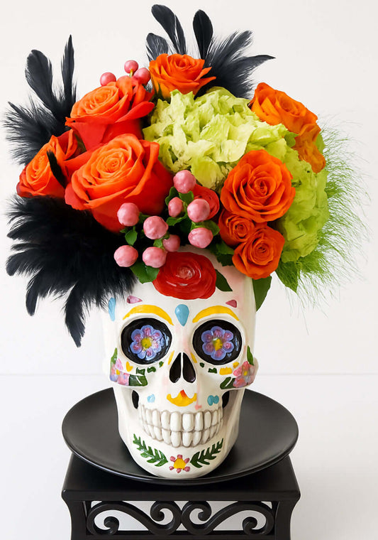 Candy Skull #666 Halloween arrangement with colorful flowers and greenery, available for flower delivery Brentwood CA 94513.