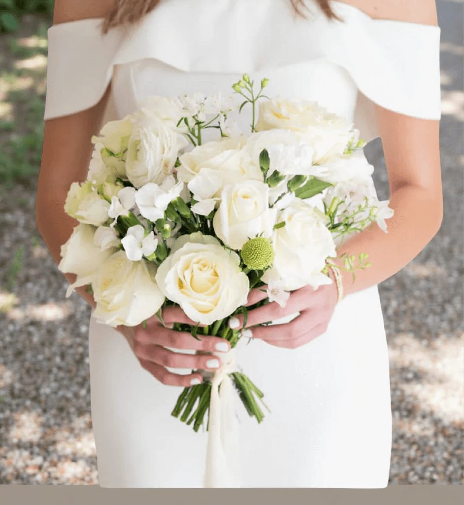 Elegant white wedding bouquet featuring roses and greenery, ideal for flower delivery Brentwood CA 94513.