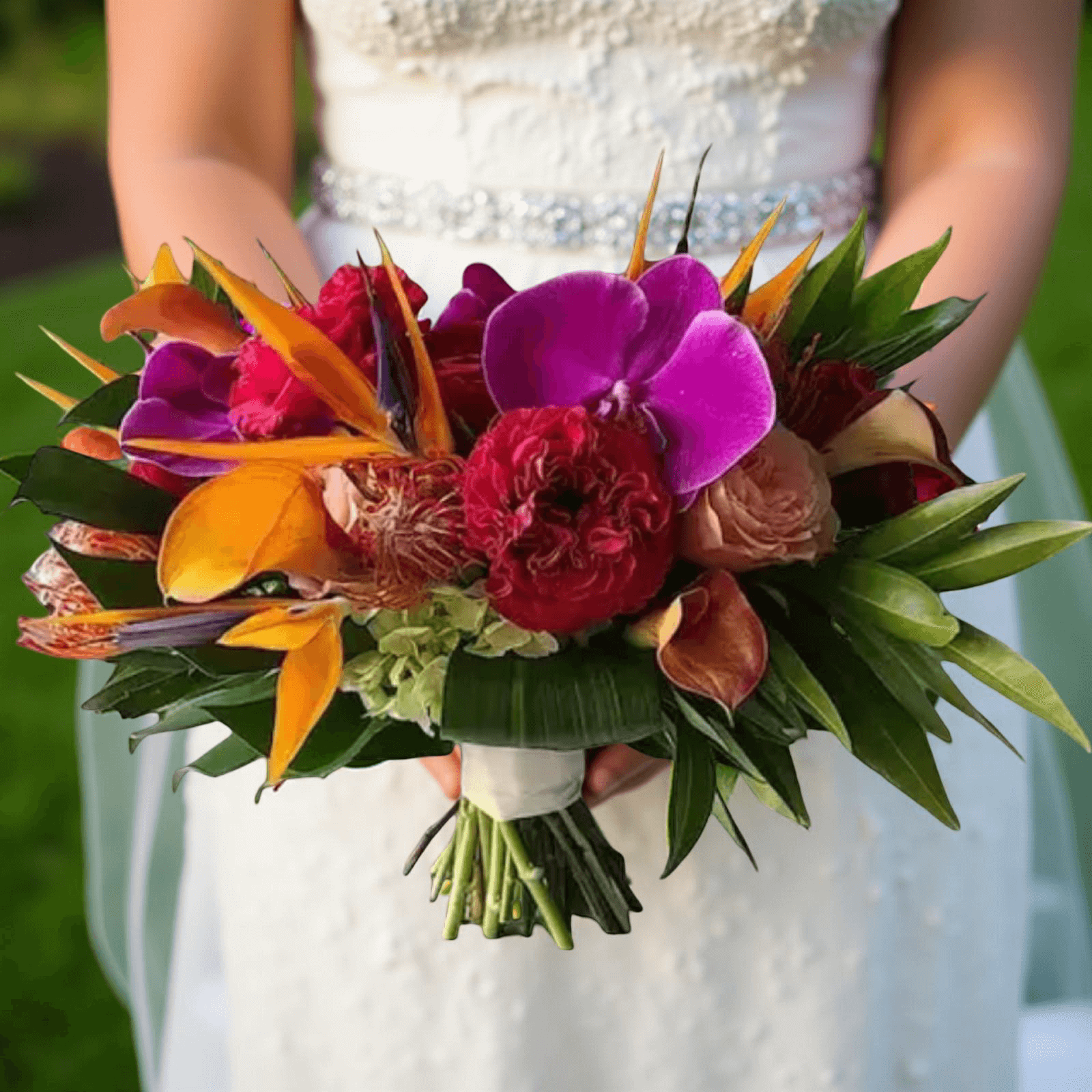 Tropical wedding bouquet with vibrant flowers, perfect for beach weddings in Half Moon Bay.